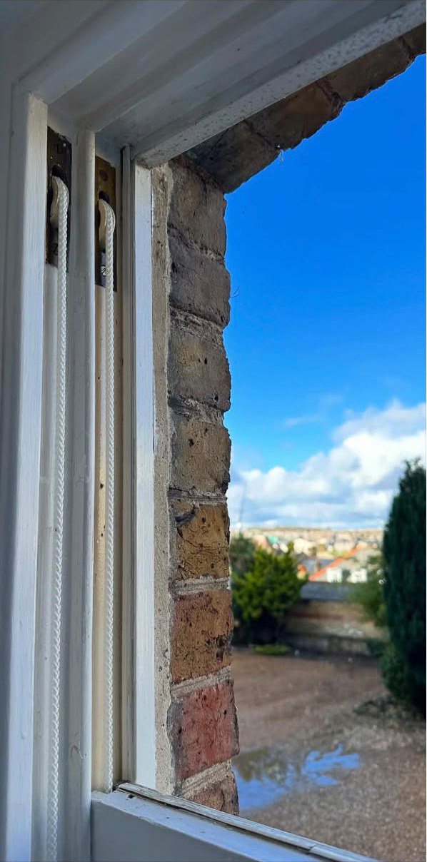 Window opening prepared for a new bespoke sash window